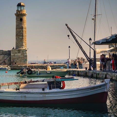 Explore the winding alleyways and backstreets that surround Rethymno's historic harbour