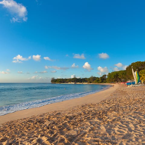 Watch the sunset on the nearby Sandy Lane Beach