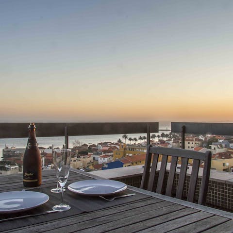 Enjoy drinks and dinner alfresco on your private balcony overlooking the Douro River