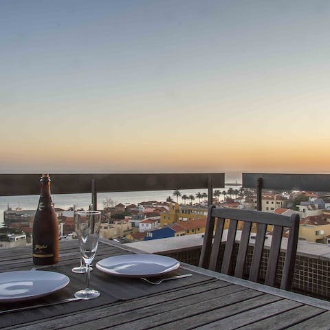 Enjoy drinks and dinner alfresco on your private balcony overlooking the Douro River