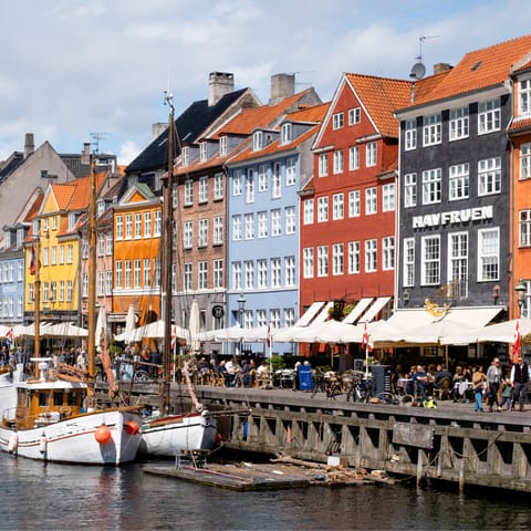 Drink by the Nyhavn Harbour in the sun – a ten minute walk away
