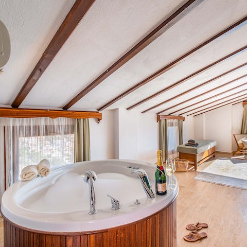 Relax with a glass of Champagne in the master suite's Jacuzzi