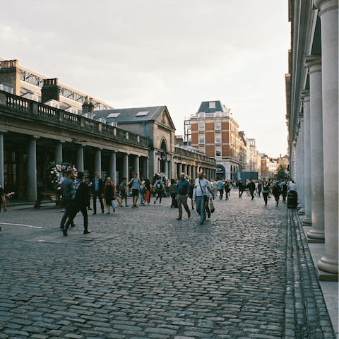 Explore Covent Garden's array of restaurants, boutiques and market stalls – it's a three-minute walk away