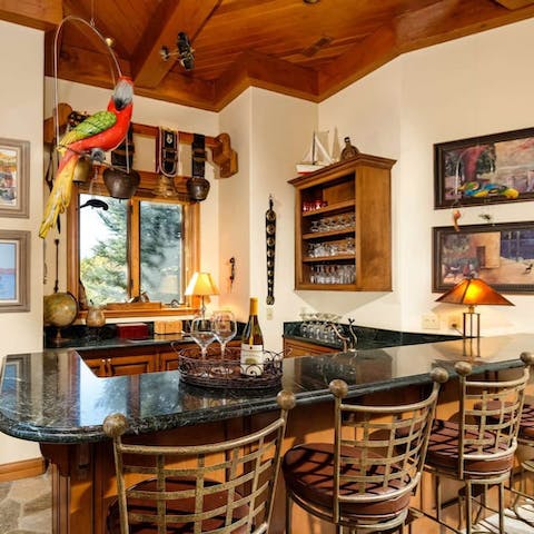 Mix up a drink at the home's epic wet bar