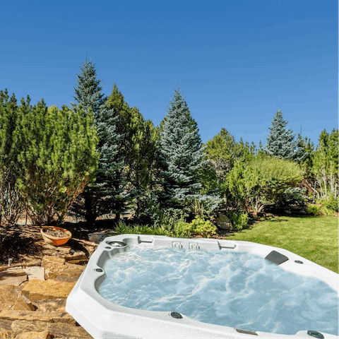 Unwind in the private hot tub any time of year