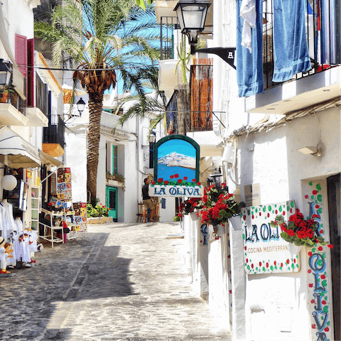Visit the cute and colourful streets of Ibiza Town
