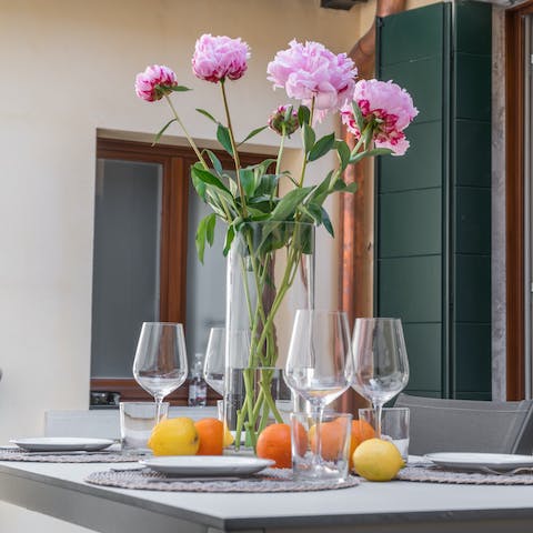 Savour the authentic taste of Italian living whilst sharing aperitifs in the courtyard   