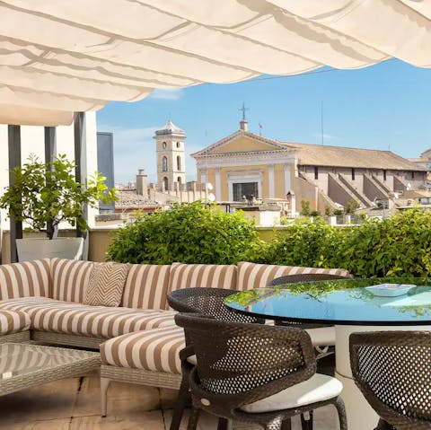 Enjoy views across the city from your incredible rooftop terrace