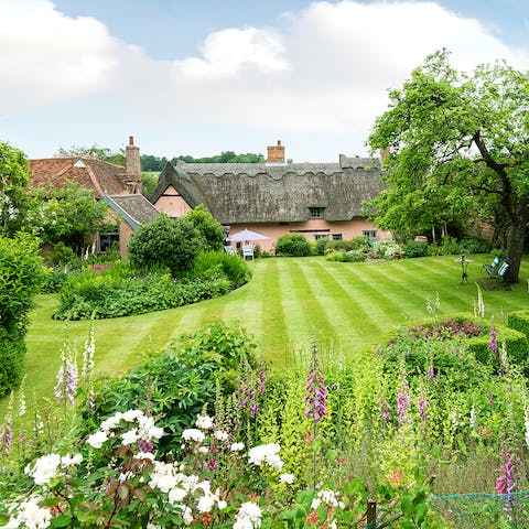 Let the kids roam in the spacious gardens of the English countryside