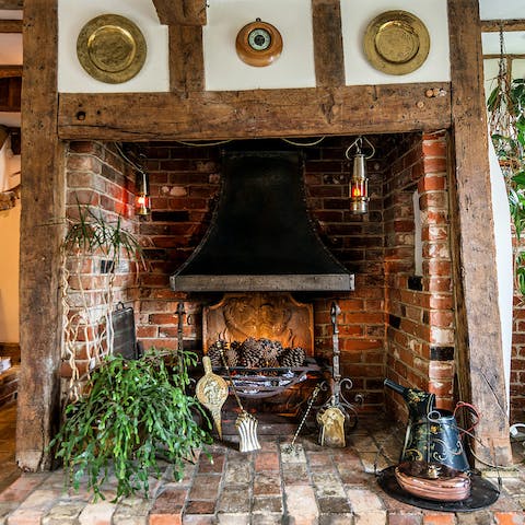 Cosy up around fireplace after a long country walk
