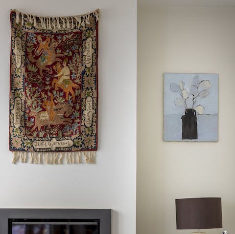 Admire artwork and wall hangings dotted around the house