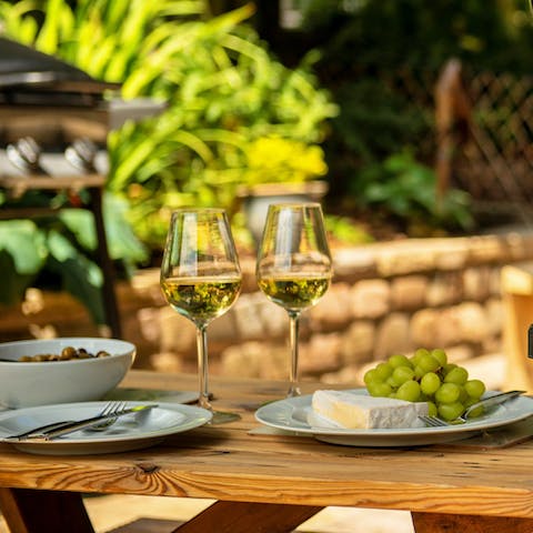 Sip a crisp glass of wine on the furnished patio as the afternoon rolls into evening