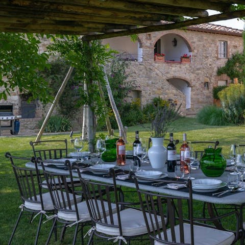 Sip Chianti under the shade of the pergola