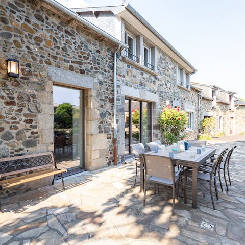 Sit down for dinner alfresco on the beautiful patio dining area