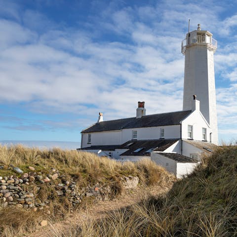 Pull on your walking boots and follow the trails across the dunes with the lighthouse as your backdrop