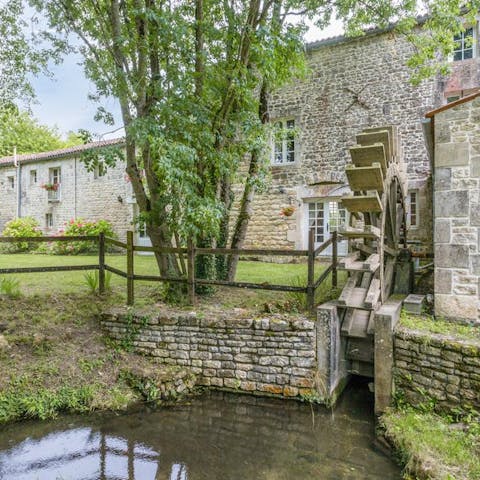 Take a moment to imagine the history of the water mill wheel