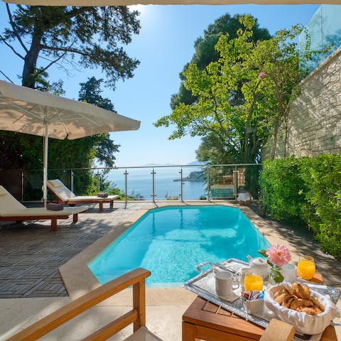 Enjoy your provided breakfast around your private pool