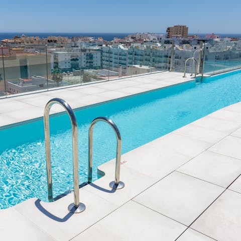 Swim in the communal pool and take in the incredible views