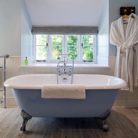 Soak in a cast-iron roll-top tub at the end of the day