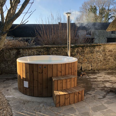 Get the wood-fired hot tub going as the sky speckles with stars