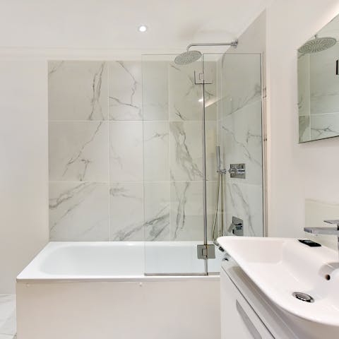 Unwind with a bubble bath after a day of exploring London on foot