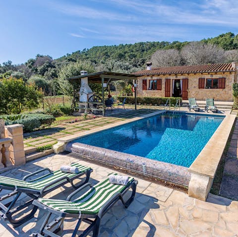 Soak up the sunshine from the private poolside of this south-facing casita