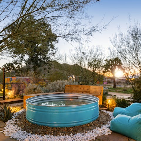 Plunge into the cowboy pool and witness a spectacular sunset