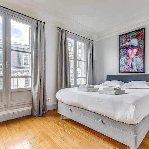 Gaze out at Parisian rooftops from the comfort of your bedroom