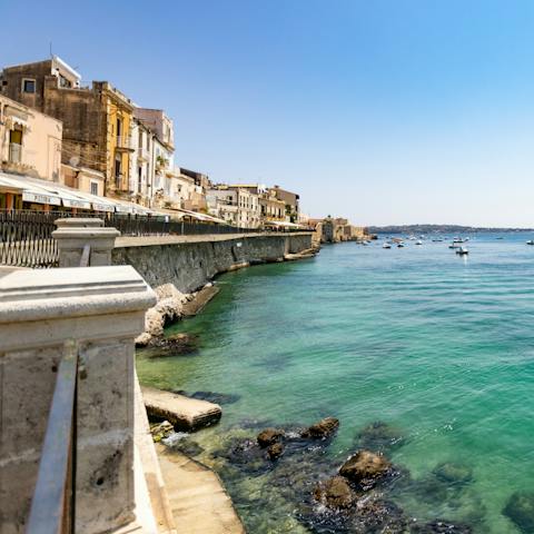 Take a dip in the Ionian off of Cala Rossa Beach, a short walk away