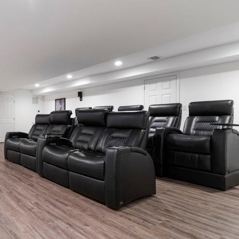 Host family movie nights in the home cinema room