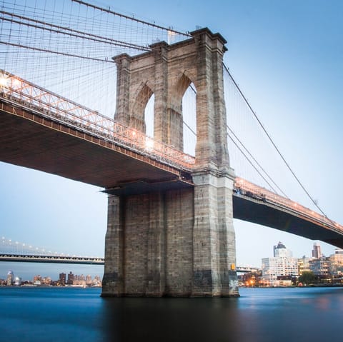 Drive over the well–known Brooklyn Bridge, only a twenty–four–minute drive away