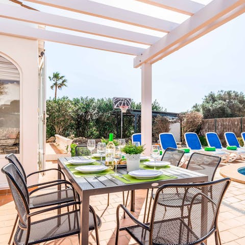 Dig into an alfresco meal or enjoy an aperatif under the sun