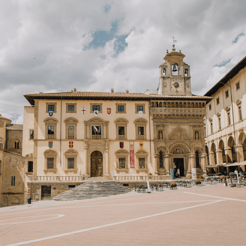 Have a leisurely coffee in Arezzo's Piazza Grande, thirty-six minutes away by car