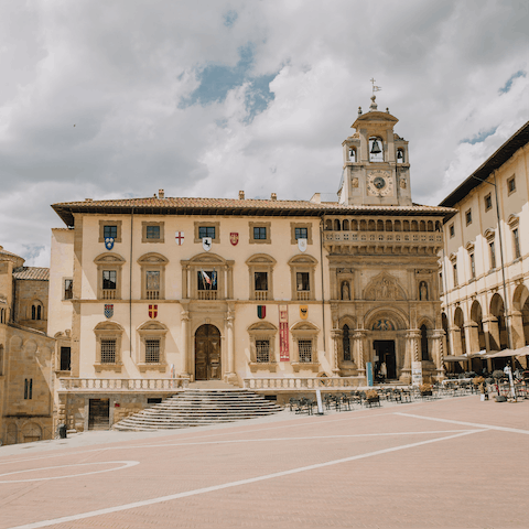Have a leisurely coffee in Arezzo's Piazza Grande, thirty-six minutes away by car