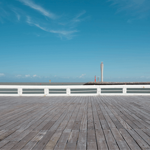 Take a stroll along Klein Strand before posting up on Ostend Beach, a short distance from your home