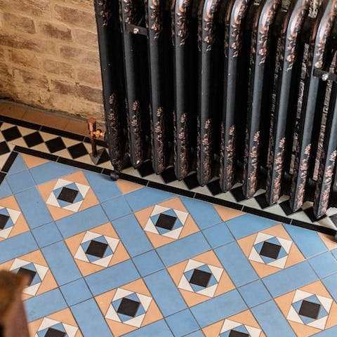 Admire the features here, such as the intricate tiled floor
