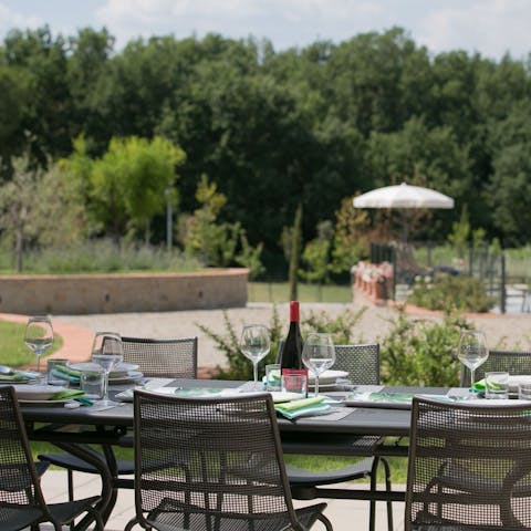 Treat your guests to a lavish alfresco dinner on the patio