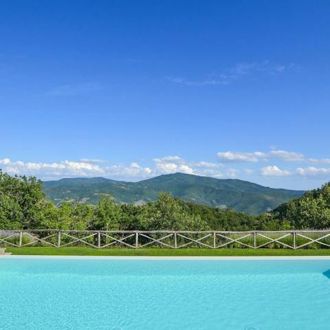 Enjoy idyllic Tuscan views while relaxing in the swimming pool