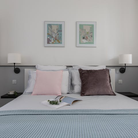 Get a comfortable night's sleep in the pastel-accented bedroom