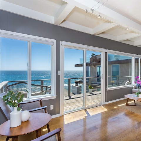 Be awed by the horizon-wide vistas of the Pacific Ocean from the light-filled living room