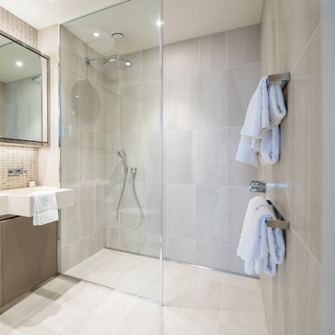 Start mornings with a relaxing soak under the bathroom's rainfall shower