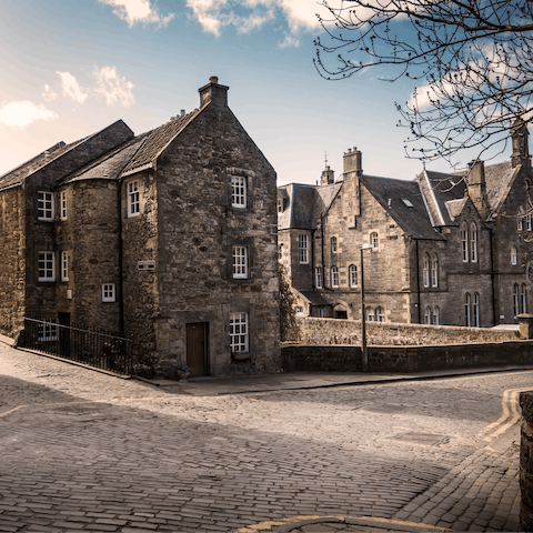 Explore the historic Old Town of Edinburgh, a five-minute walk from home