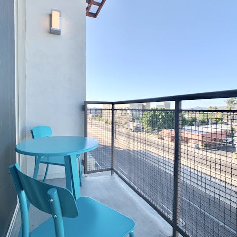 Enjoy your cup of coffee while you look out over the city