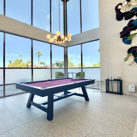 Challenge a family member to a round of pool