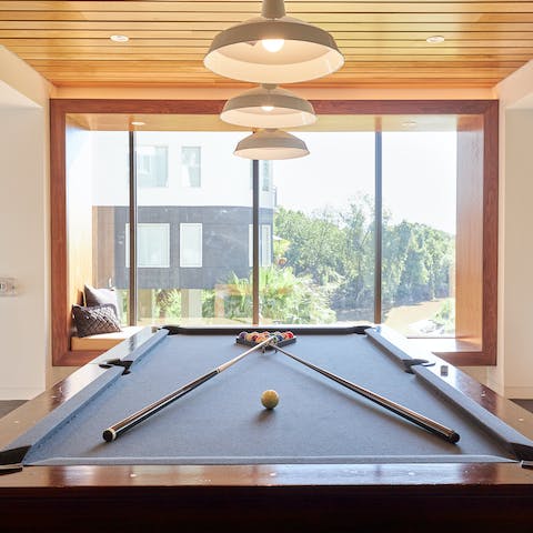 Get a friendly game of pool going in the shared games room