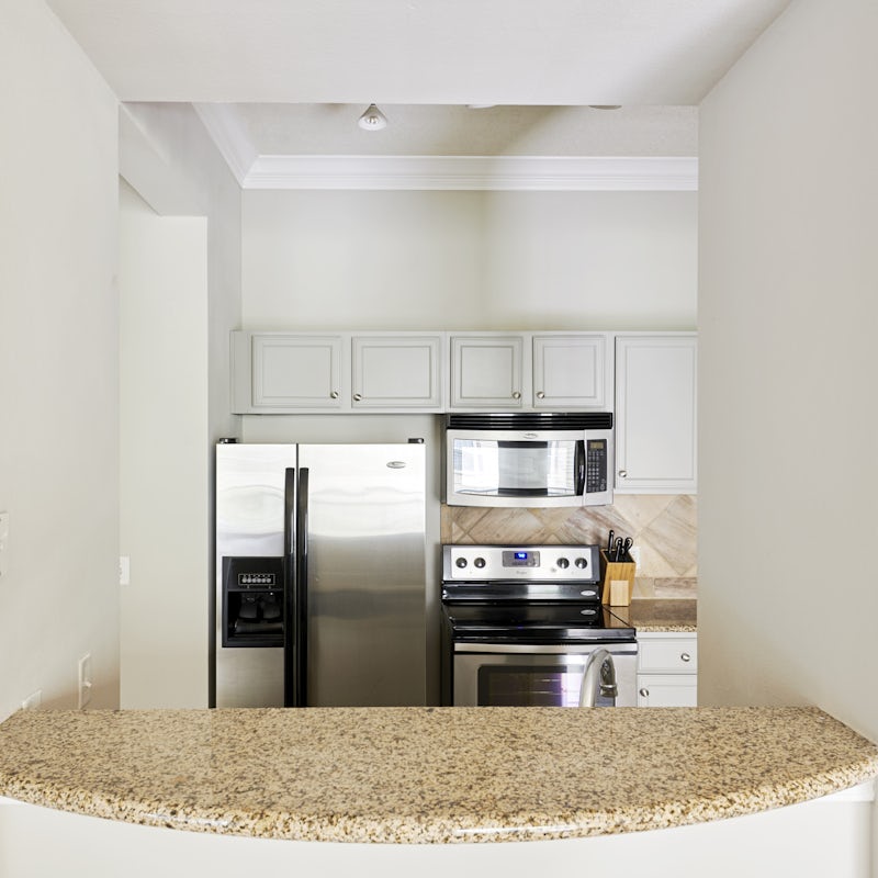 Cook in the bijou kitchen tucked into an alcove