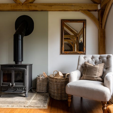 Snuggle up by the wood-burning stove with a good book and a glass of wine