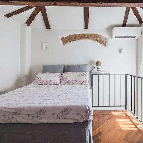 Get some rest in the bedroom with its characterful beams