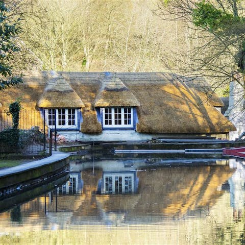 Stay in a restored, 18th-century watermill with a thatched roof