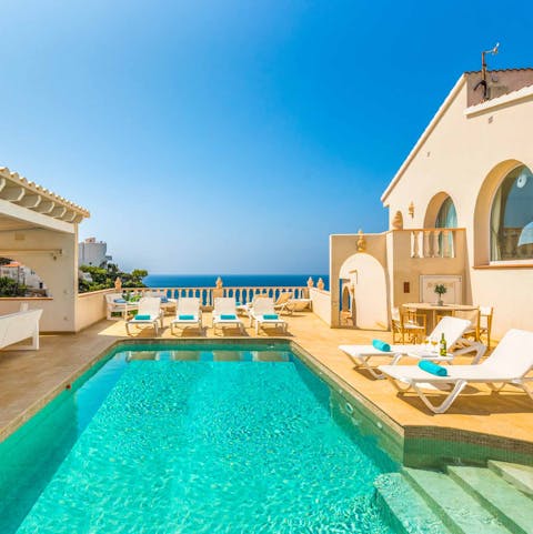 Admire views of the Mediterranean Sea from the private pool